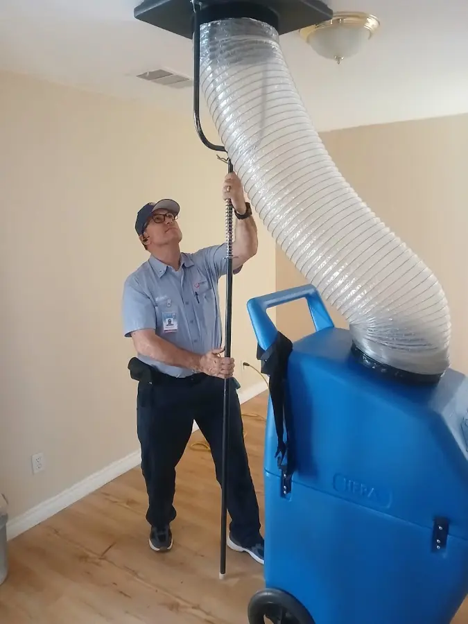 Mini Split Installation technician using HEPA equipment in Monrovia
